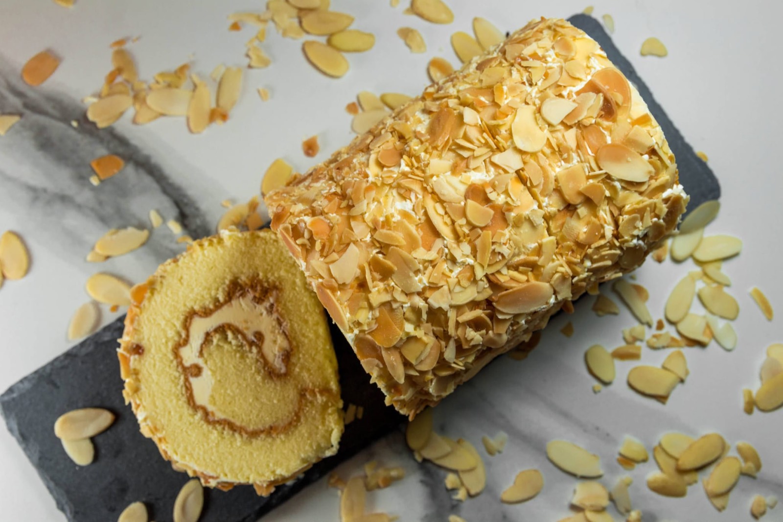 Almond Swiss Roll — Swiss roll by Yan's Cakes Singapore